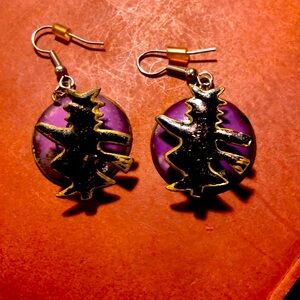 Witch on broom earrings. Very well crafted. Perfect accent to any costume.